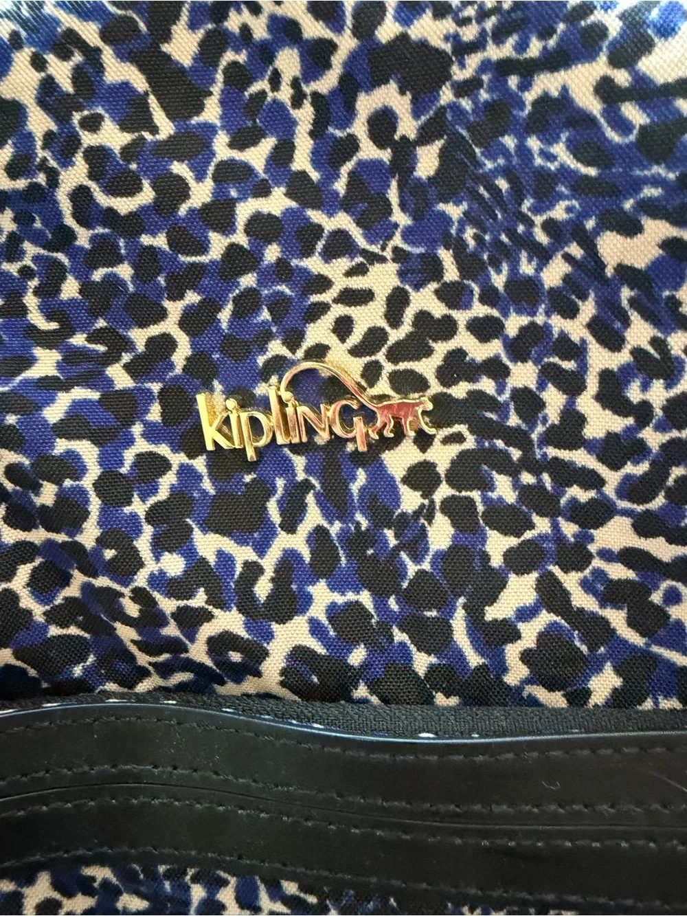 Kipling Navy and Black Leopard-Print Backpack with travel sleeve